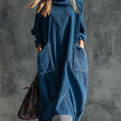 Blue corduroy midi dress by My Store, featuring a casual fit, long sleeves, and a relaxed silhouette, displayed on a hanger.
