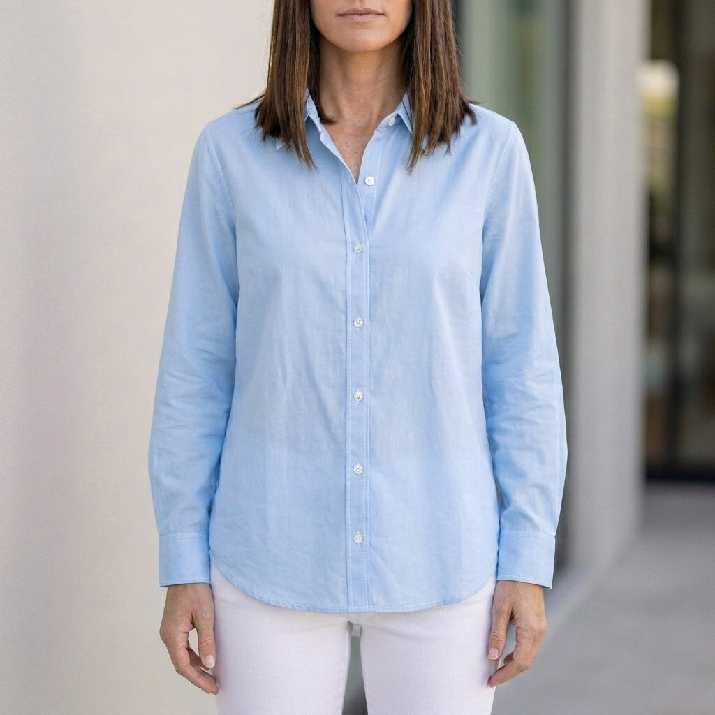 Blue linen summer blouse for women with button front, stylish and lightweight top perfect for warm weather.