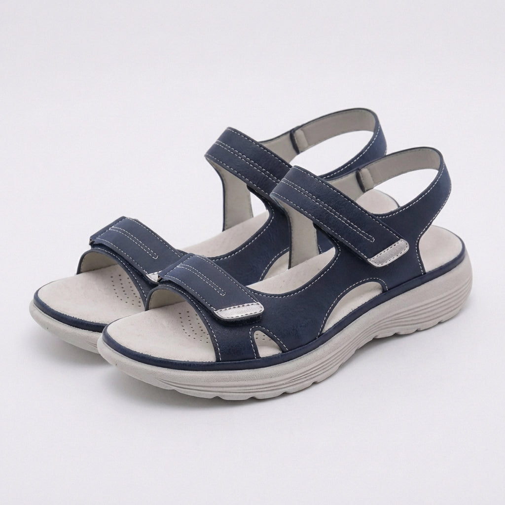 Blue orthopedic comfort fit sandals with chunky sole and adjustable straps, designed for support and casual wear.