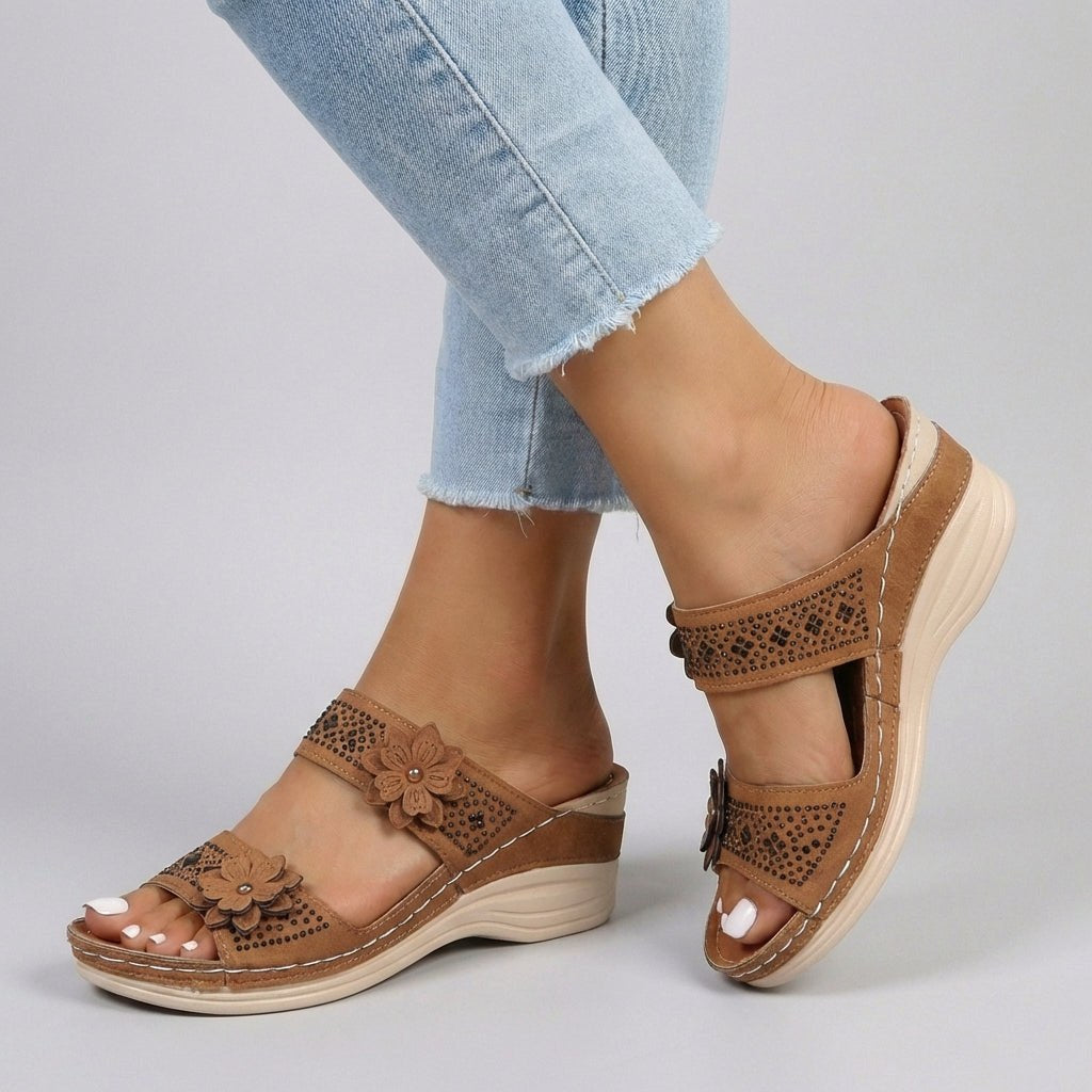 Brown floral strap wedge heeled sandals for women by Tammy Bradley, featuring stylish design and comfortable heel height.