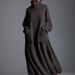 Brown knit maxi dress for women featuring long sleeves and a flowing silhouette, perfect for casual or elegant occasions.