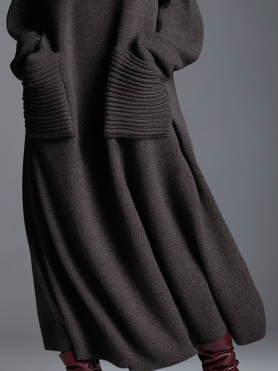 Brown knit maxi dress for women, featuring a flowing design and long sleeves, perfect for casual or elegant occasions.