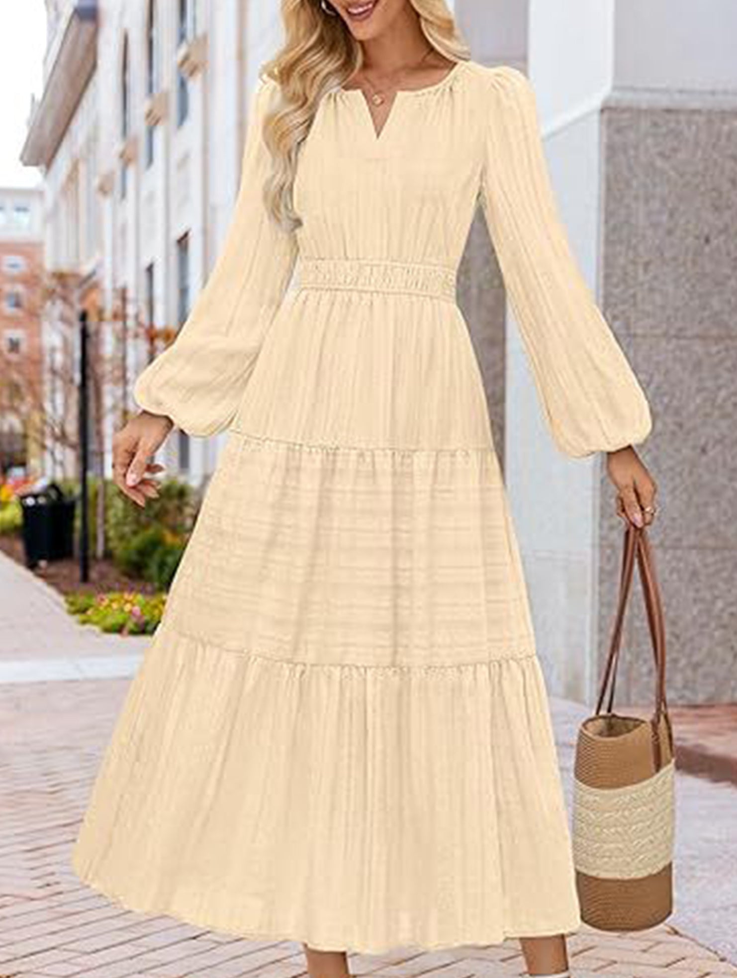 White V-neck pleated waist tiered long-sleeved dress, stylish and flowy, with a flattering fit and elegant design.