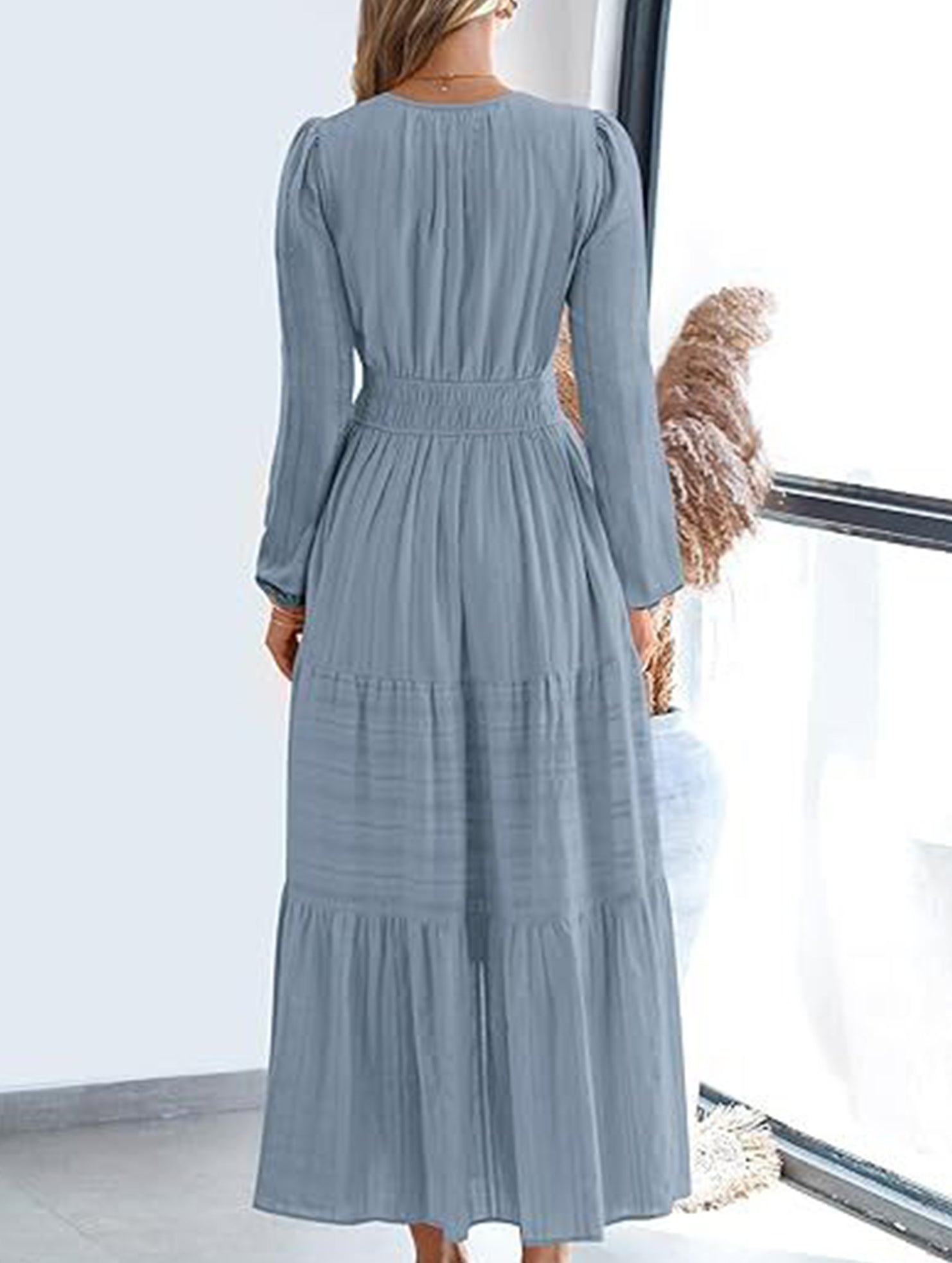 Blue-grey V-neck pleated waist tiered long-sleeved dress with a flowing silhouette, stylish and elegant for women.