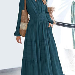 White V-neck pleated waist tiered long-sleeved dress from My Store, showcasing flowing fabric and elegant design.