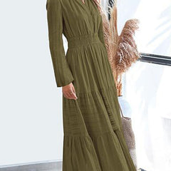 White V-neck pleated waist tiered long-sleeve dress with a flowing silhouette, featuring elegant pleats and tiered design.