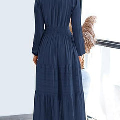 White V-neck pleated waist tiered long-sleeved dress with a relaxed fit, stylish and elegant for any occasion.