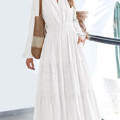 White V-neck pleated waist tiered long-sleeved dress with a flowing silhouette, stylish and elegant for various occasions.