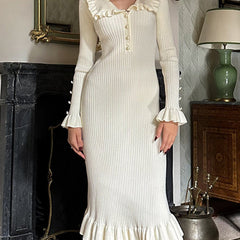 White retro ruffled knit dress from My Store featuring a vintage-inspired design and a fitted silhouette.