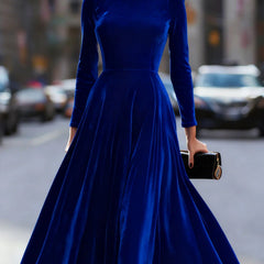 Blue velvet round neck long-sleeved dress by Tammy Bradley, featuring a stylish fit and elegant design.