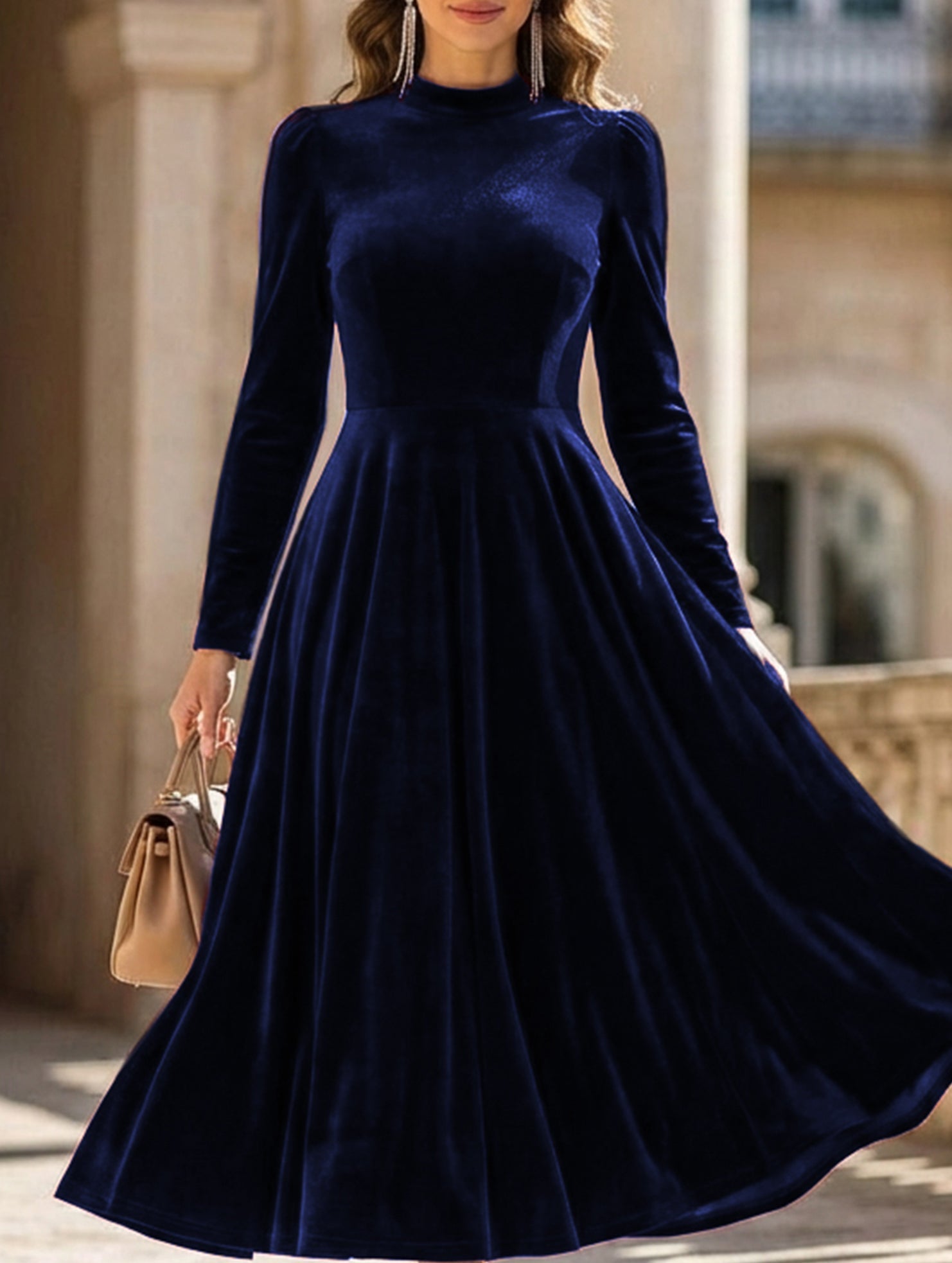 White velvet round neck long-sleeved dress by Tammy Bradley, showcasing a stylish and elegant dress with a smooth fabric finish.