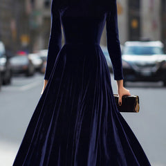 White velvet round neck long-sleeved dress by Tammy Bradley, featuring a stylish and elegant design.
