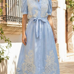 White pastoral style openwork embroidered dress with delicate detailing, perfect for elegant occasions.
