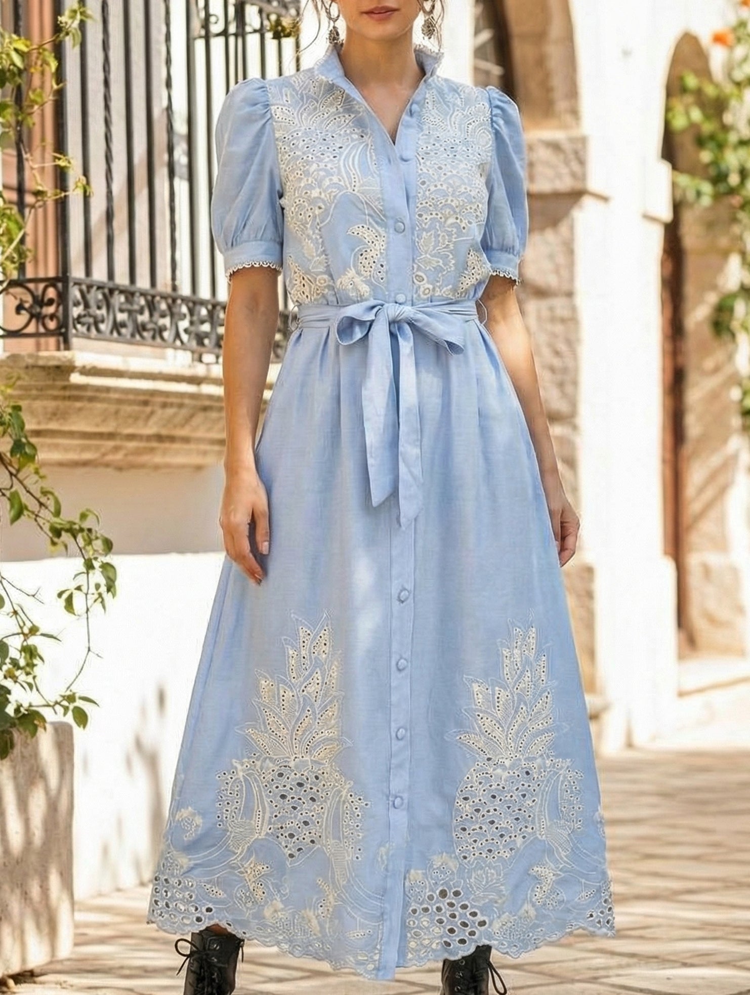 White pastoral style openwork embroidered dress with delicate detailing, perfect for elegant occasions.