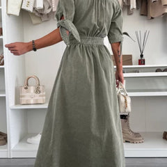 White deep V-neck fitted shirt dress with long sleeves and button details, stylish and elegant for casual or dressy occasions