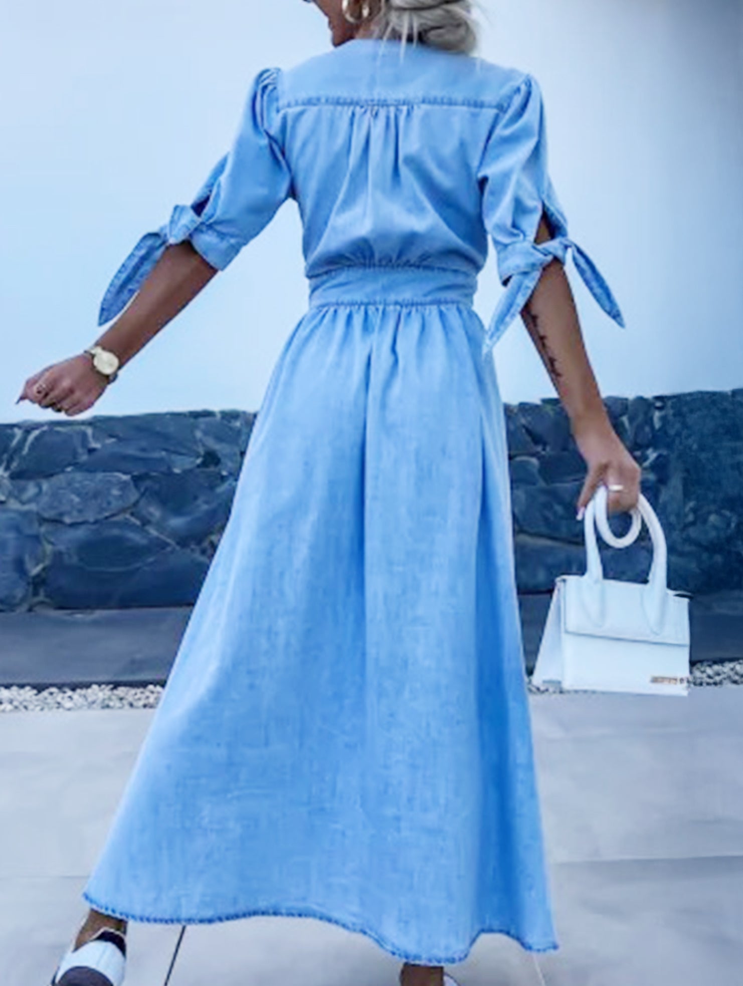Blue deep V-neck fitted shirt dress, stylish and elegant, showcasing the tailored design and sleek silhouette.