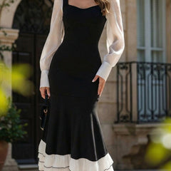 Black colorblock long sleeve mermaid dress from My Store, featuring a fitted silhouette and elegant design.