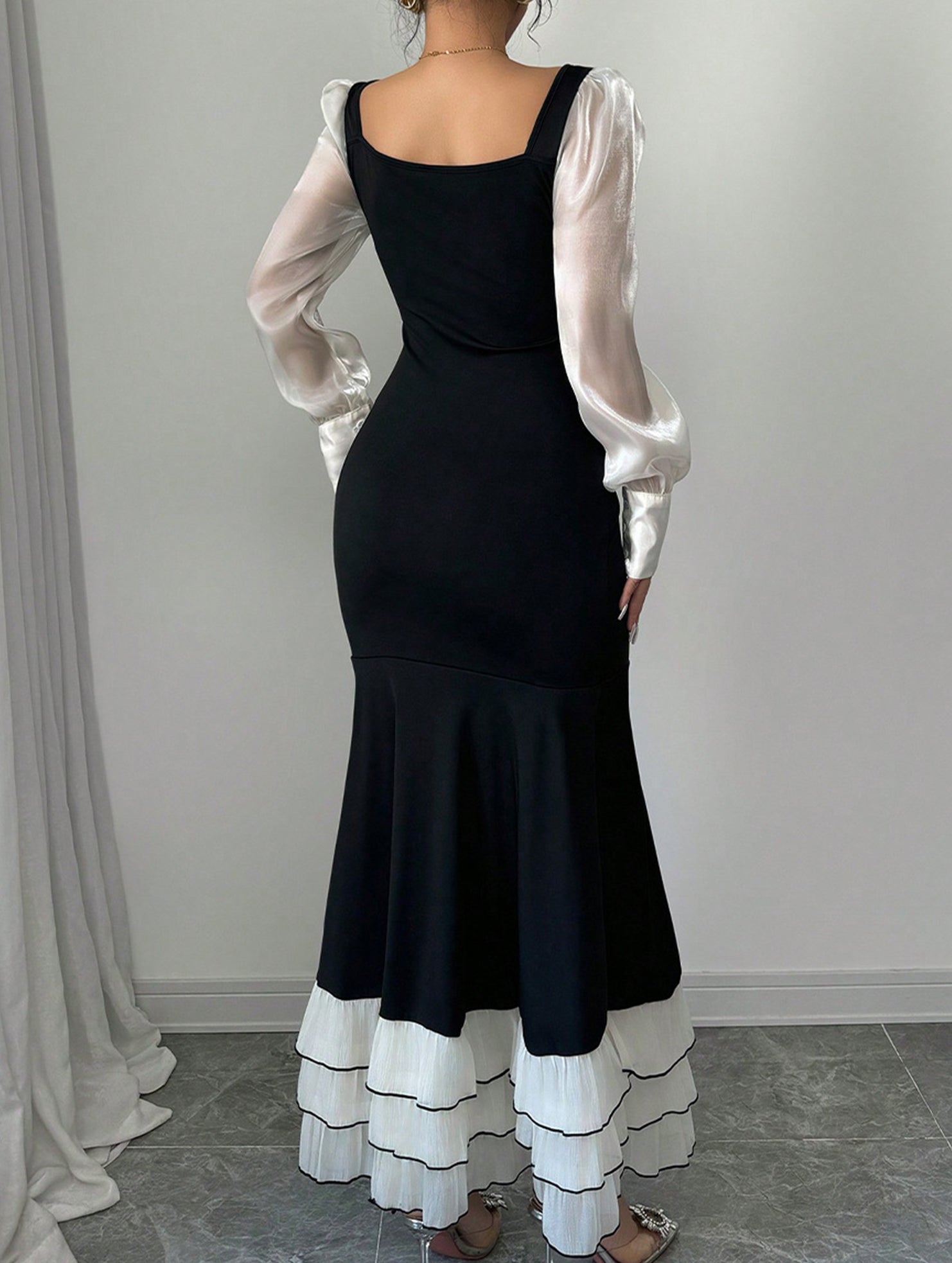 Black colorblock long sleeve mermaid dress by My Store, featuring a fitted silhouette and stylish design.