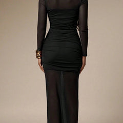 Black mesh patchwork ruched bodycon maxi dress with long sleeves and fitted silhouette, featuring a stylish design.