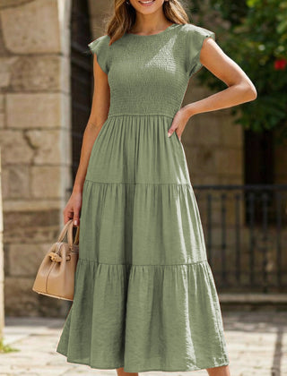 White sleeved cross-border dress from My Store, featuring a solid color design and stylish detailing on the fabric.