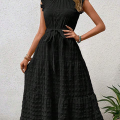 Black ruffled flutter sleeve tie-textured dress by My Store, featuring a stylish silhouette and soft fabric details.