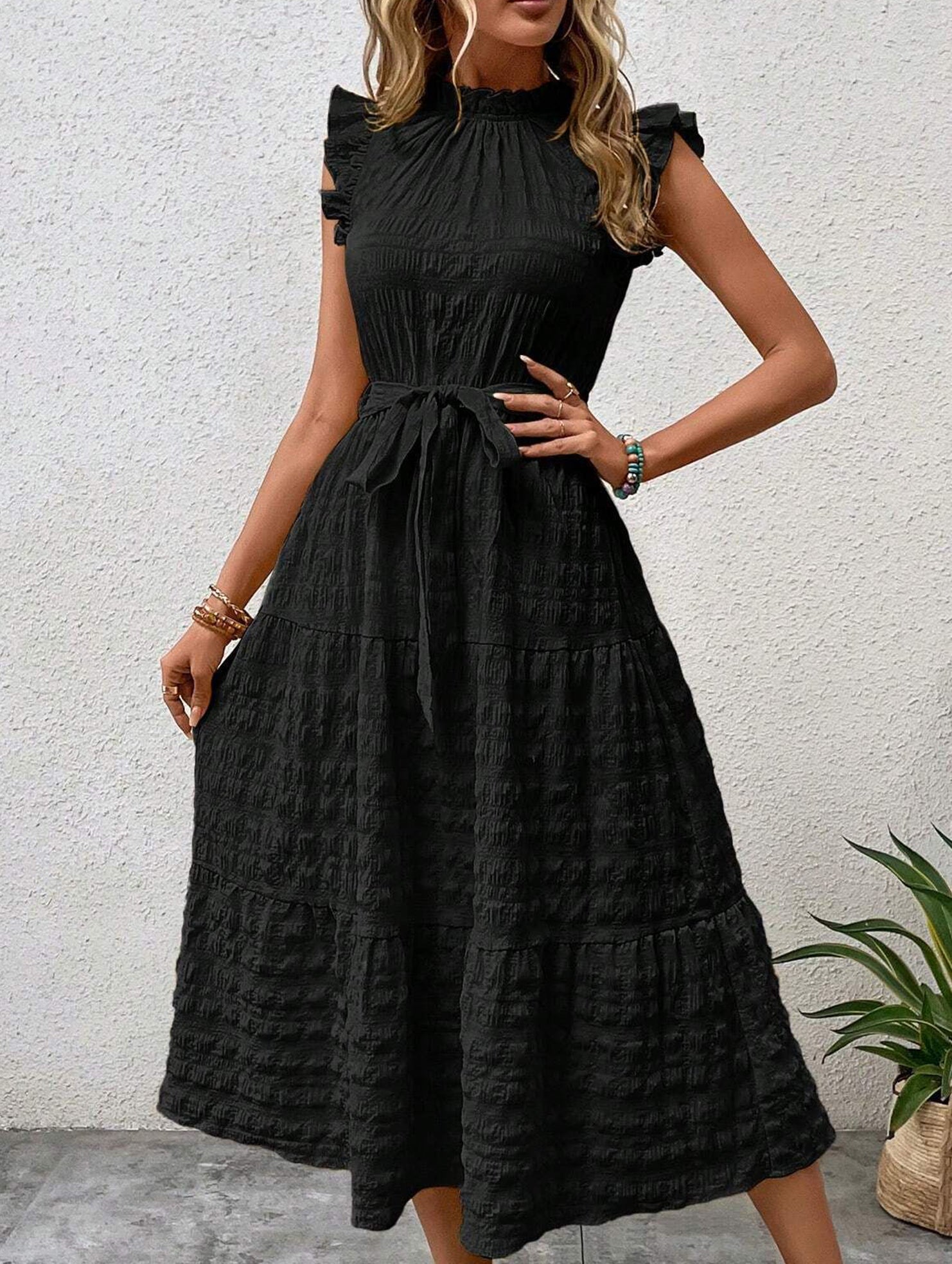 Black ruffled flutter sleeve tie-textured dress by My Store, featuring a stylish silhouette and soft fabric details.