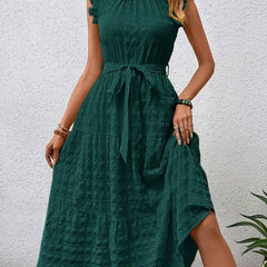 White ruffled flutter sleeve tie-textured dress from My Store featuring a stylish, elegant design.