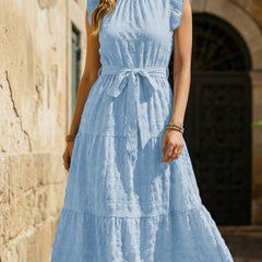 White ruffled flutter sleeve tie textured dress by My Store, featuring a stylish design with elegant details.