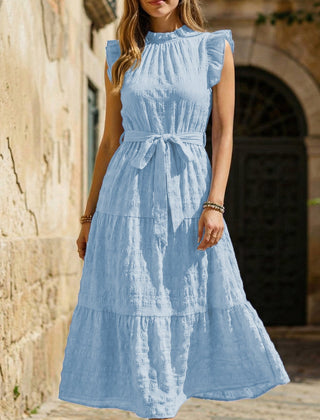 White ruffled flutter sleeve tie textured dress by My Store, featuring a stylish design with elegant details.