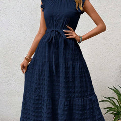 White Ruffled Flutter Sleeve Tie Textured Dress from My Store, showcasing a stylish dress with ruffles and textured fabric.