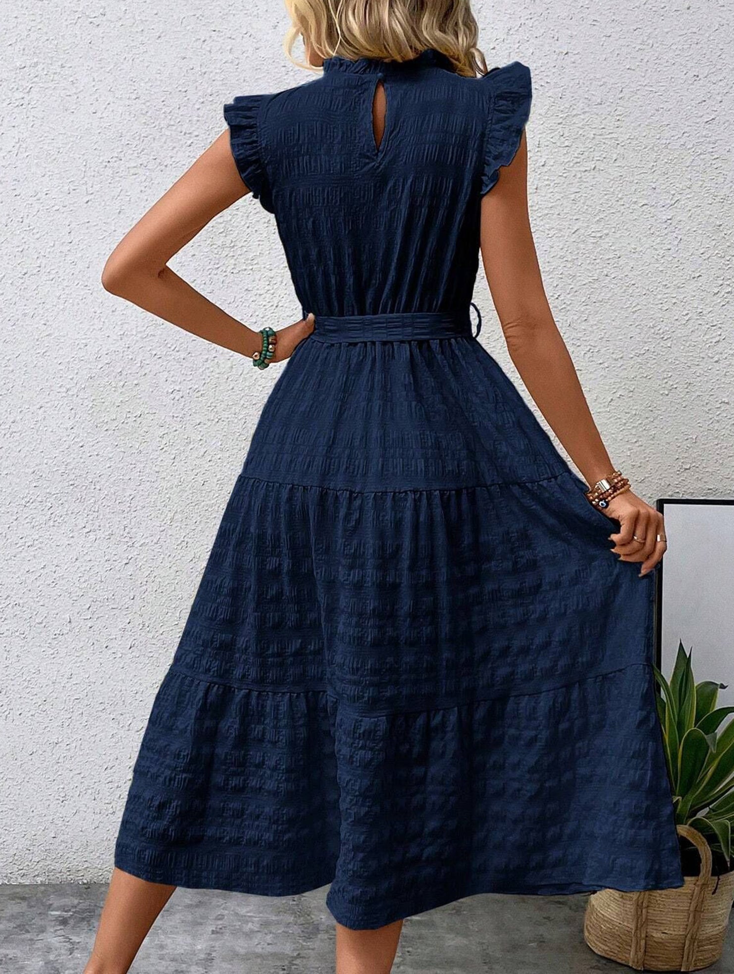 White ruffled flutter sleeve textured dress from My Store, featuring a tie waist and stylish design.