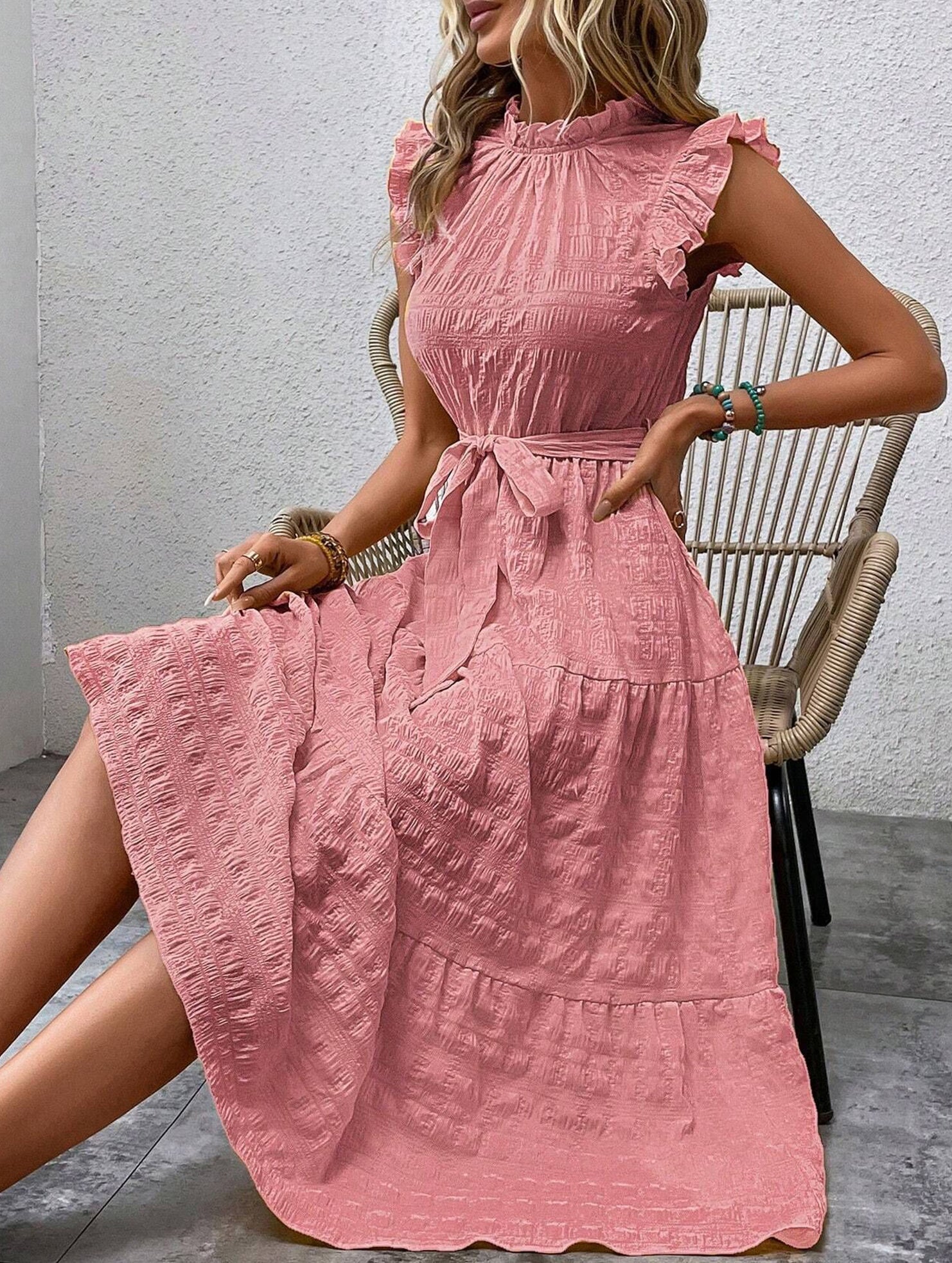 White ruffled flutter sleeve tie textured dress by My Store, showcasing soft fabric and stylish design.