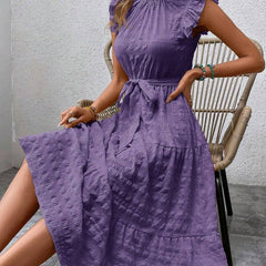 Purple ruffled flutter sleeve tie-textured dress with a flowing silhouette, stylish and feminine for elegant occasions.