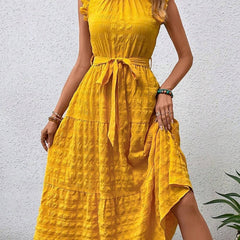 Yellow ruffled flutter sleeve tie textured dress, stylish and feminine, featuring a fitted waist and flowy skirt.