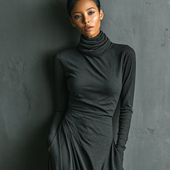 Cotton turtleneck maxi dress, elegant evening dress in soft fabric, featuring a fitted bodice and flowing skirt.