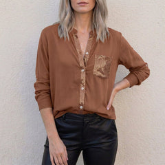 Dark brown women's summer blouse with V-neck, denim fabric, and button front, featuring a relaxed fit and stylish design.