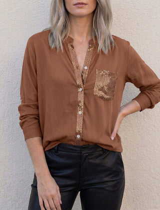 Dark brown women's summer blouse with V-neck, denim fabric, and button front, featuring a relaxed fit and stylish design.