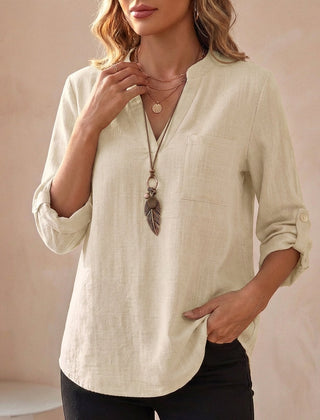 Dirty white V-neck linen summer blouse for women, flowy and lightweight, perfect for casual warm-weather outfits.