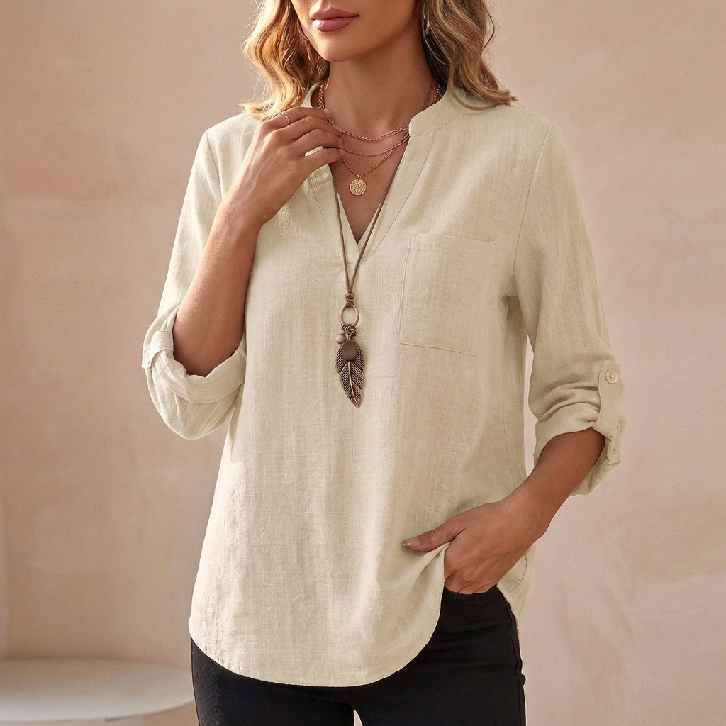 Dirty white V-neck linen summer blouse for women, flowy and lightweight, perfect for casual warm-weather outfits.