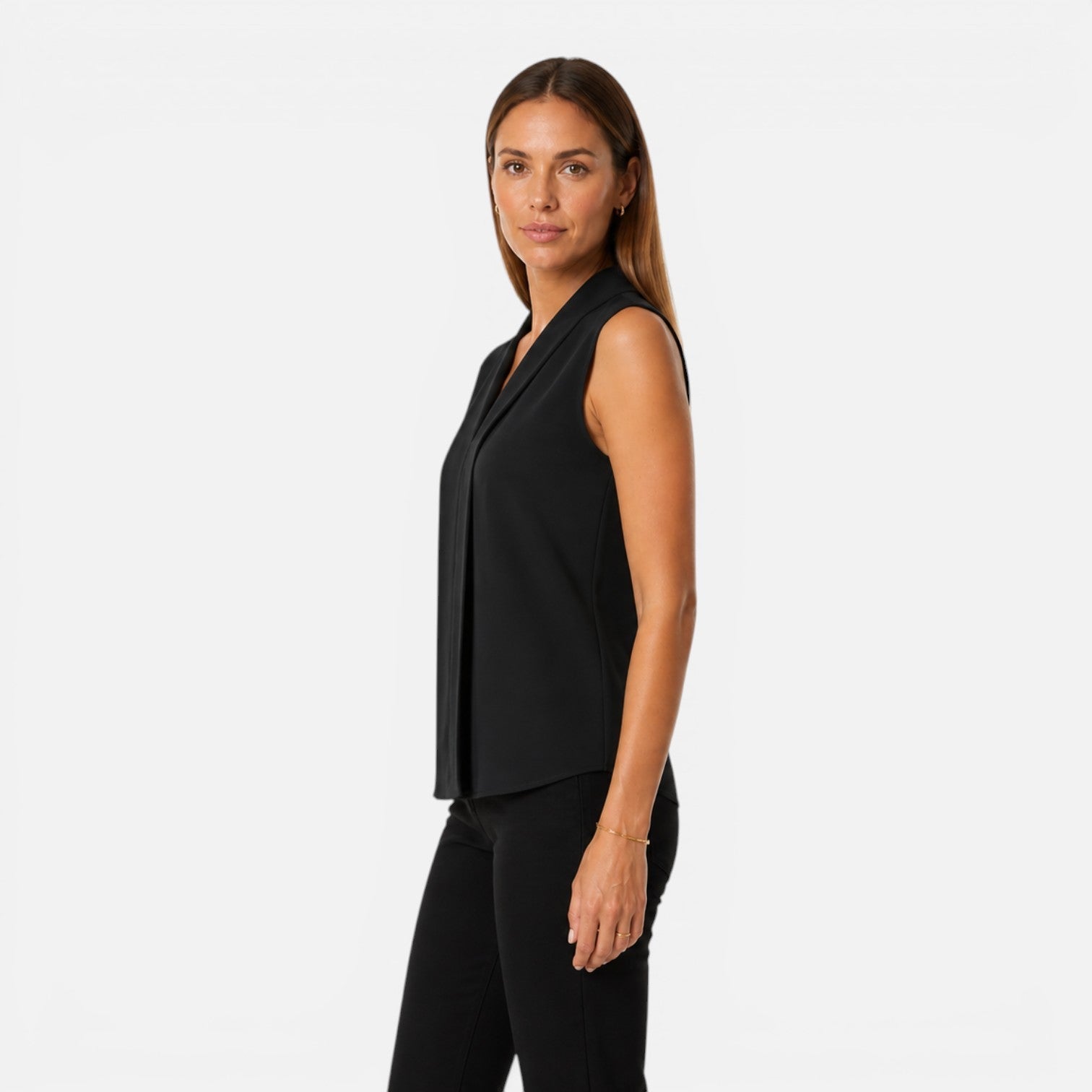 Elegant sleeveless women's blouse with draped V-neck and timeless fit, perfect for stylish office and casual wear.