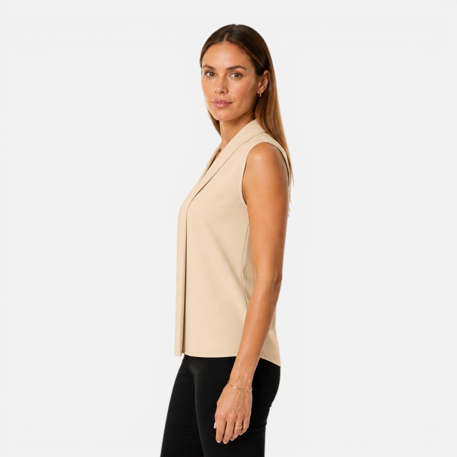 Women's sleeveless blouse with elegant draped V-neck and timeless fit, perfect for stylish casual or office wear.