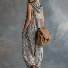 Apricot leopard print chiffon jumpsuit with hood, designed for women, featuring stylish pant legs and a relaxed fit.