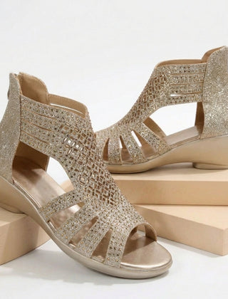 Gold women's orthopedic heeled wedge sandals with cut-out design, stylish and supportive for comfortable wear.