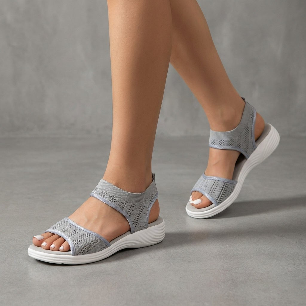 Gray knit ankle-strap sandals for women by Tammy Bradley, featuring open toes and stylish ankle straps.