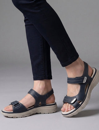 Gray orthopedic comfort fit sandals with chunky sole and adjustable straps, designed for supportive casual wear.