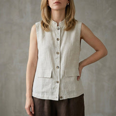 Gray sleeveless denim summer blouse for women with button front, casual top, stylish and lightweight for warm weather.