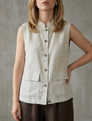 Gray sleeveless denim summer blouse for women with button front, casual top, stylish and lightweight for warm weather.