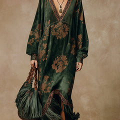 Green faux suede tassel maxi dress for women featuring flowing fabric and tassel details, perfect for stylish occasions.