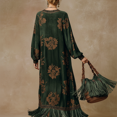 Green faux suede tassel maxi dress for women, flowing silhouette with tassel details, stylish and comfortable for various occasions.
