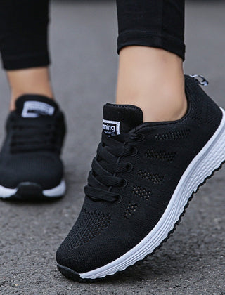 Comfortable women's orthopedic walking shoes with lace-up knit design, ideal for daily support and active walking.